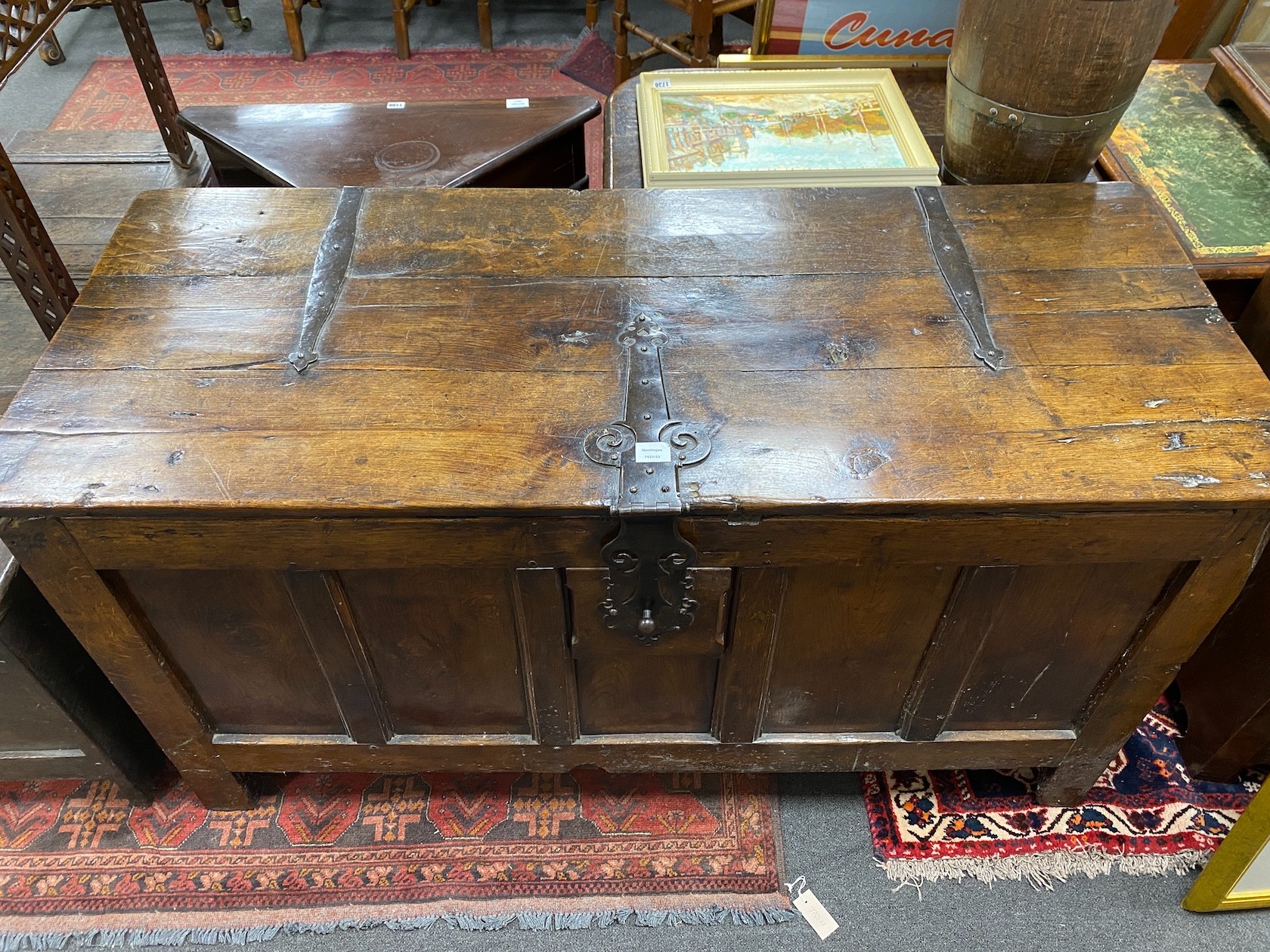 A large 19th century or earlier Provincial French iron bound coffer, length 152cm, depth 64cm, height 81cm